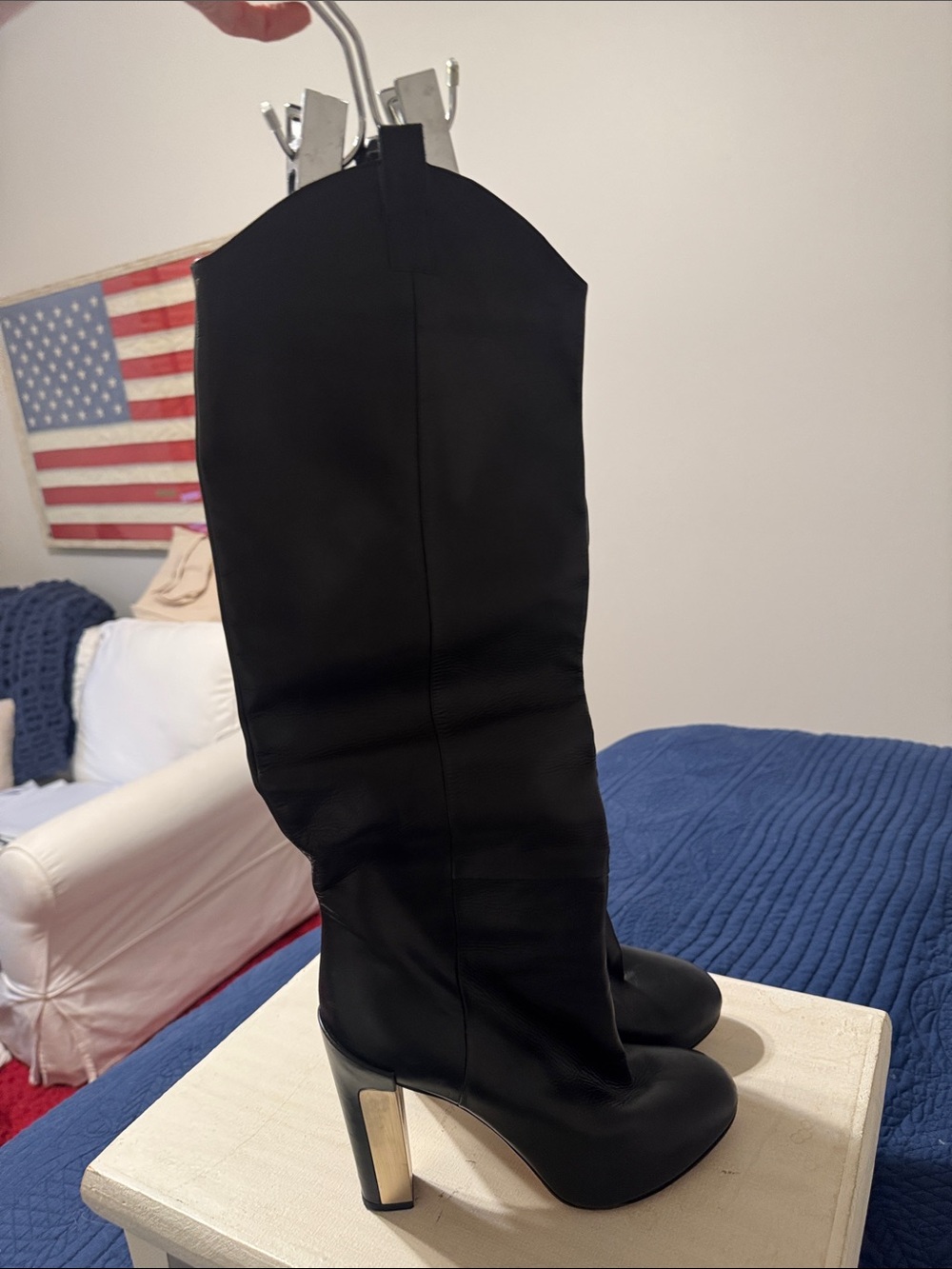 Women’s tall black leather boots